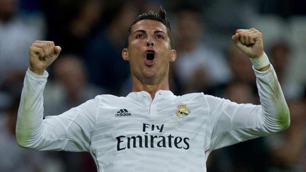MADRID, SPAIN - SEPTEMBER 23:  Cristiano Ronaldo of Real Madrid CF celebrates scoring their fifth goal during the La Liga match between Real Madrid CF and Elche CF at Estadio Santiago Bernabeu on September 23, 2014 in Madrid, Spain.  (Photo by Gonzalo Arroyo Moreno/Getty Images)